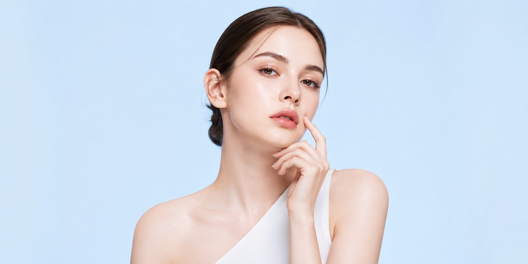 Portrait of a woman with a fair skin tone, the Fitzpatrick range this laser guide covers